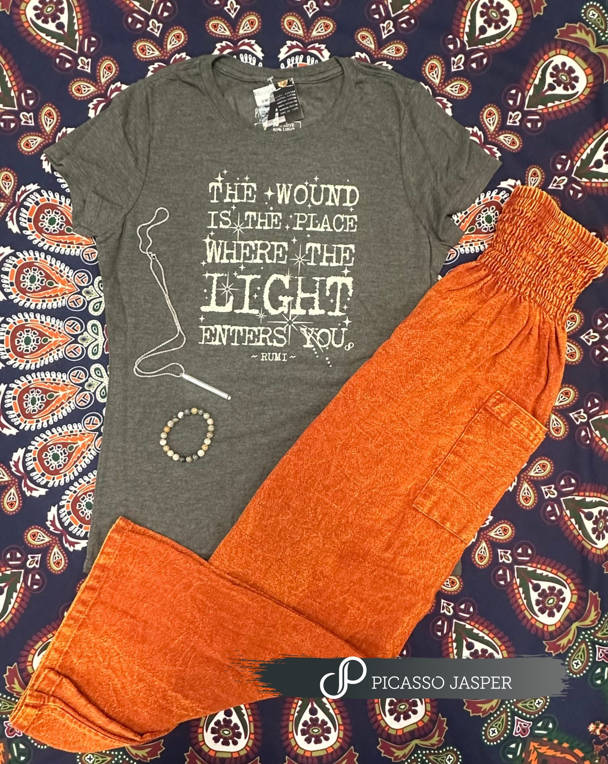 The Wound is the Place Where the Light Enters, Tee